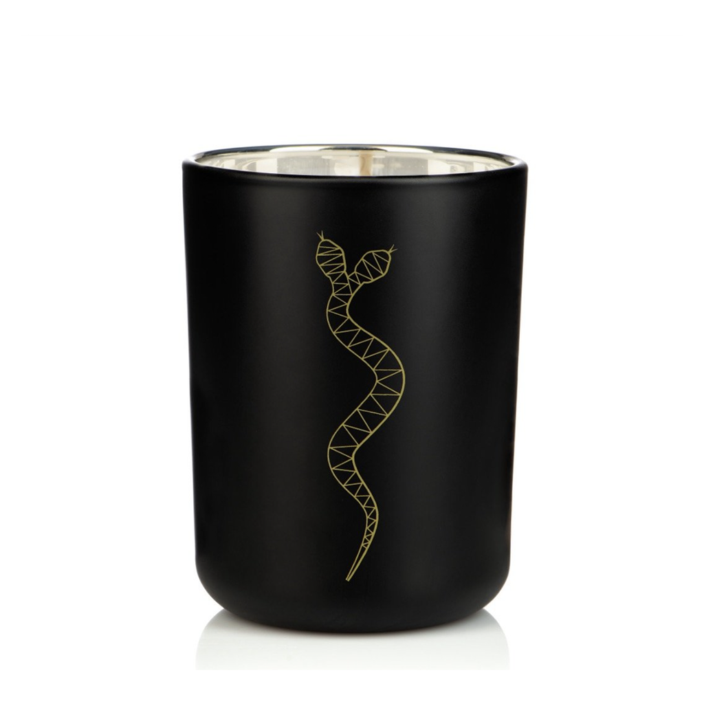 Black candle holder with gold snake design.