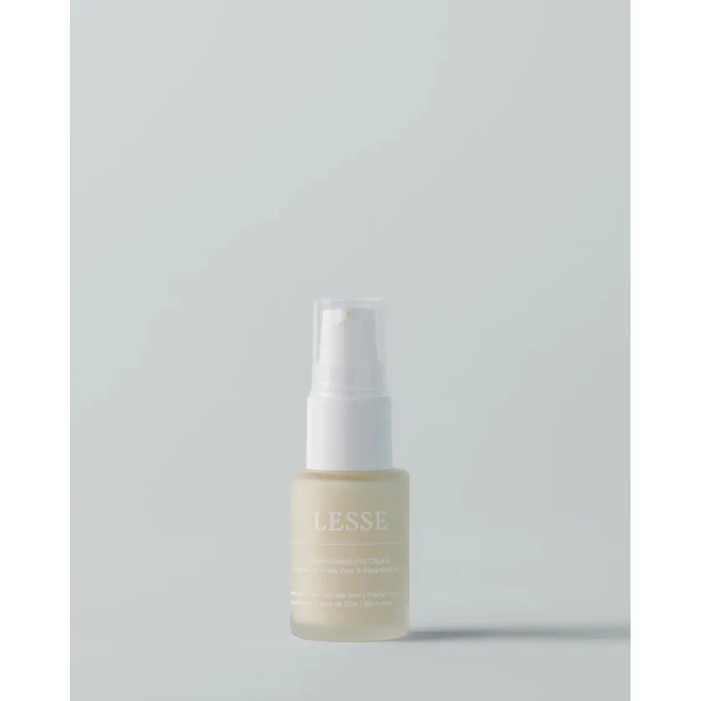 A single bottle of lesse skincare product against a plain background.