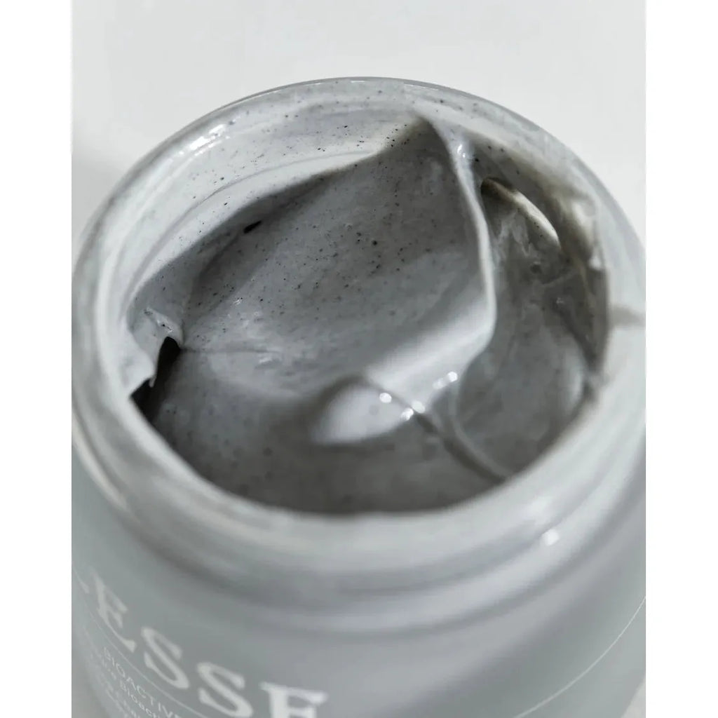 Close-up of an open jar of lesse bioactive mask.