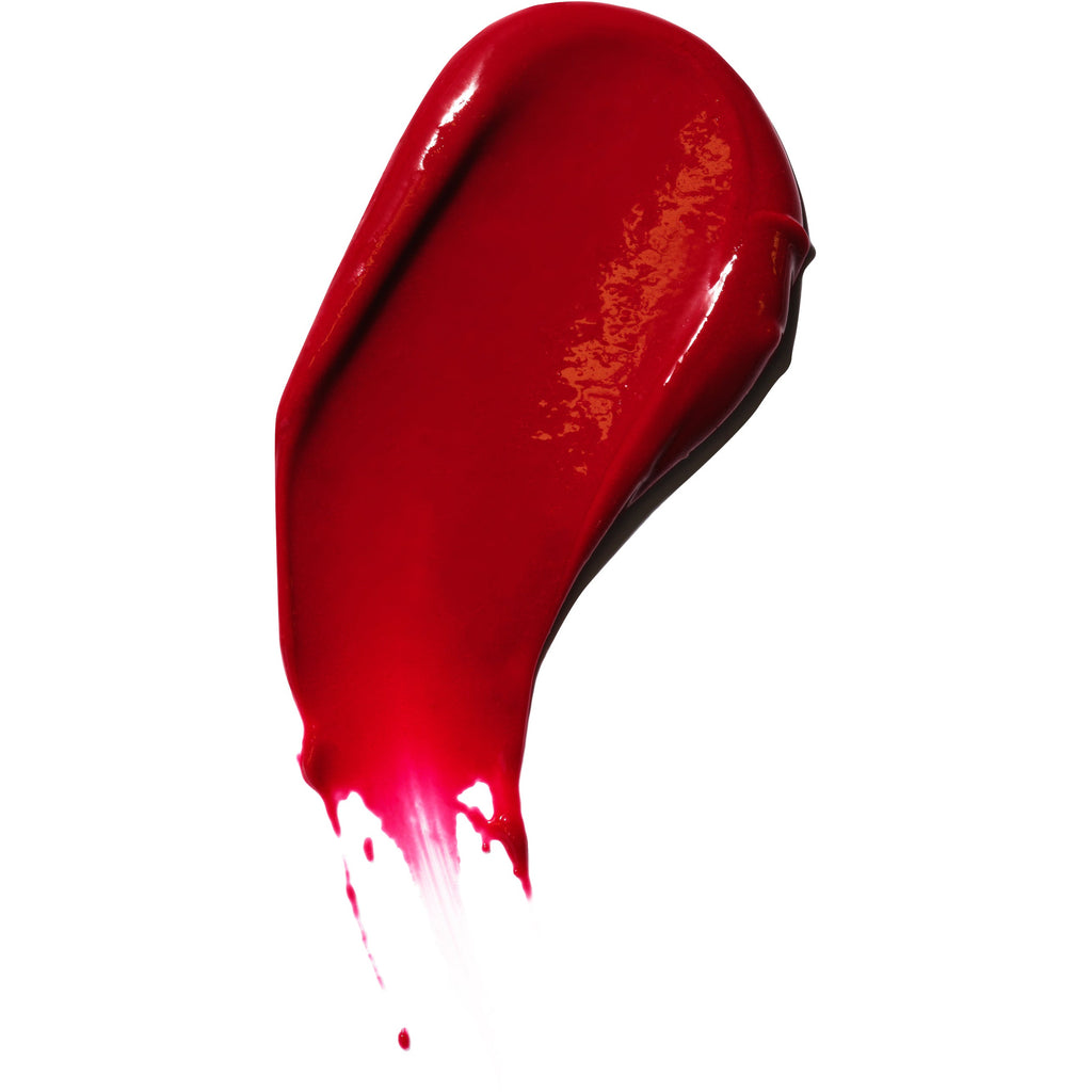 A smudge of glossy red lipstick.