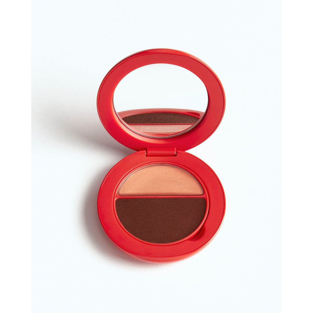 Red compact with a mirror and a dual-toned brown eyeshadow palette.