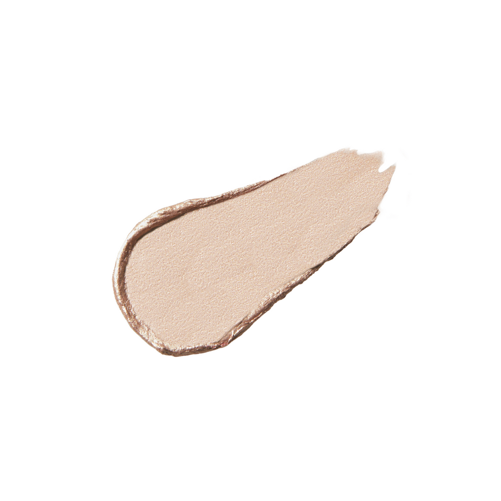 A swatch of beige liquid foundation makeup isolated on a white background.