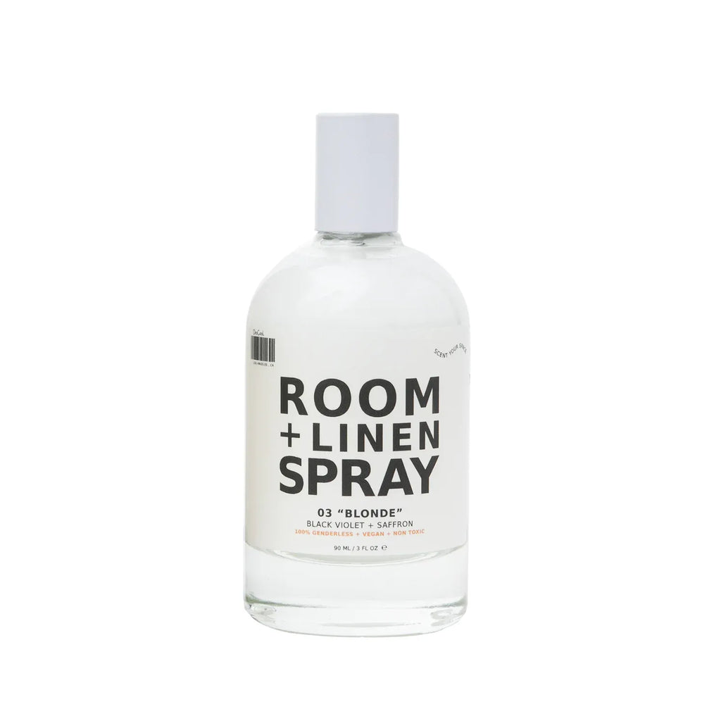 Bottle of room and linen spray with a minimalist label design.