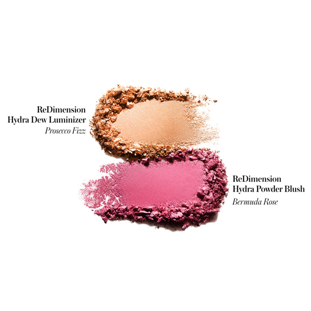 Two crushed makeup powders, one in a champagne hue labeled "prosecco fizz," and the other in a rose shade labeled "bermuda rose.