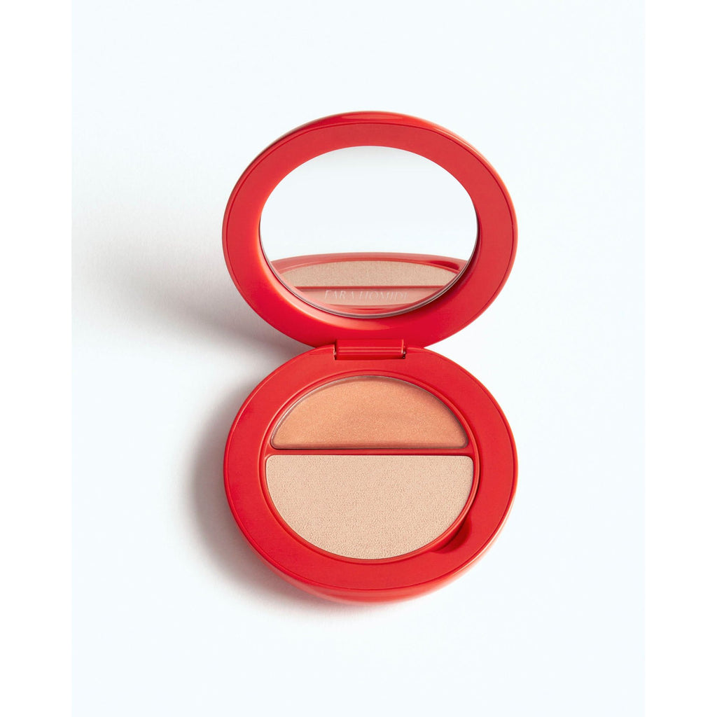 Compact powder makeup with mirror in a red case.