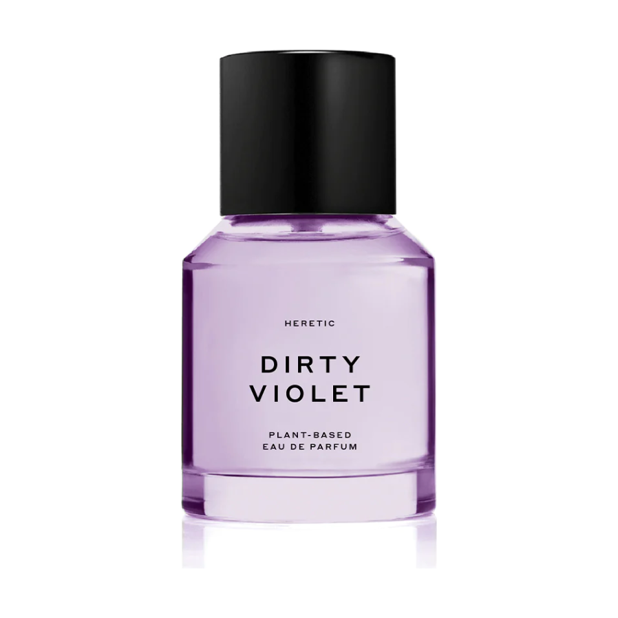A bottle of heretic dirty violet plant-based eau de parfum against a white background.