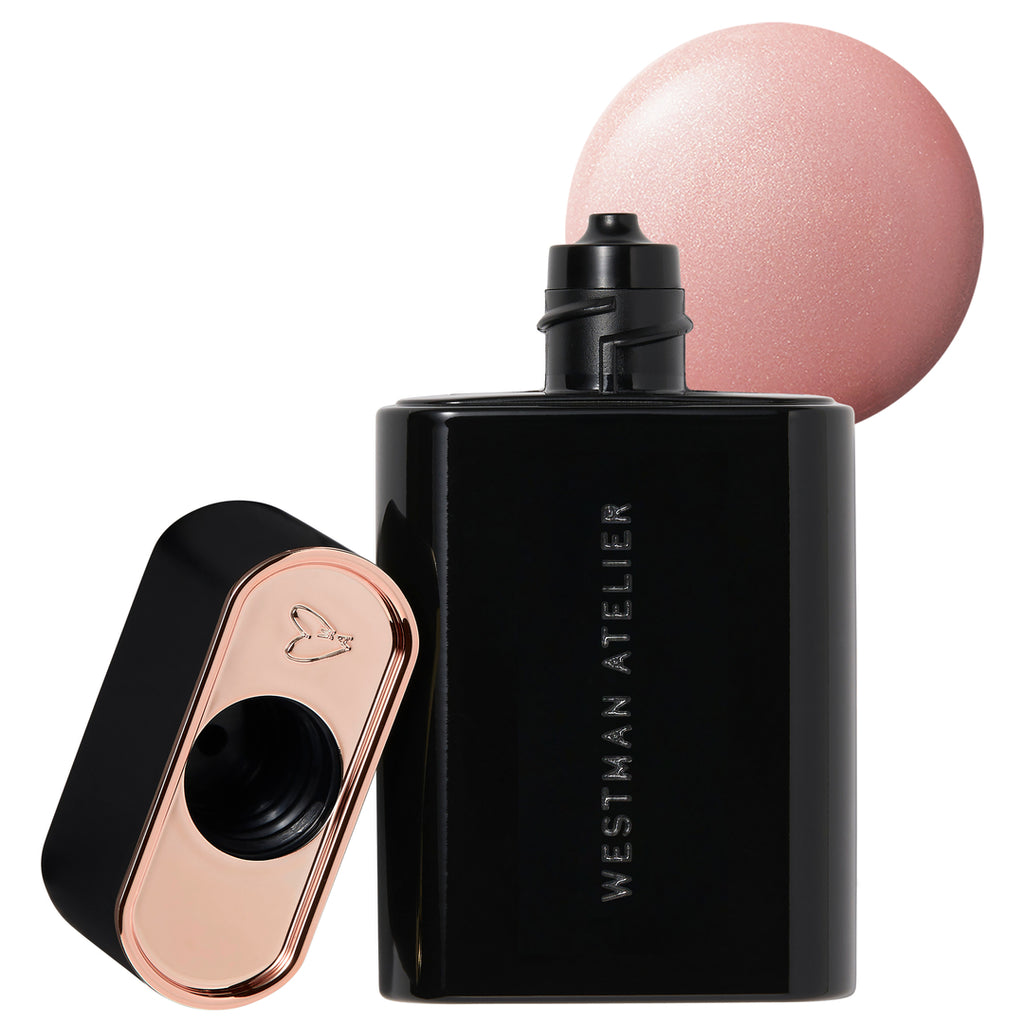 Black and rose gold cosmetic bottle with a spherical pink applicator.