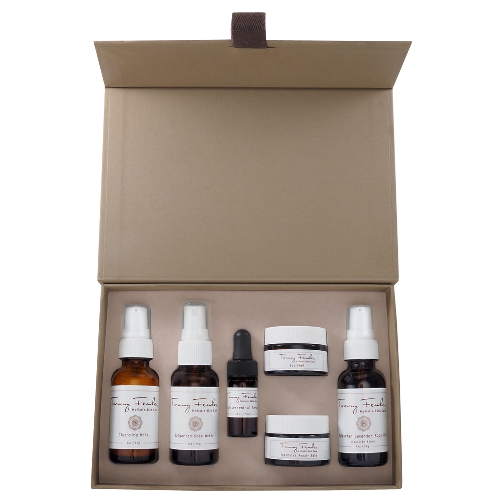 A set of skincare products neatly arranged in a cardboard gift box.