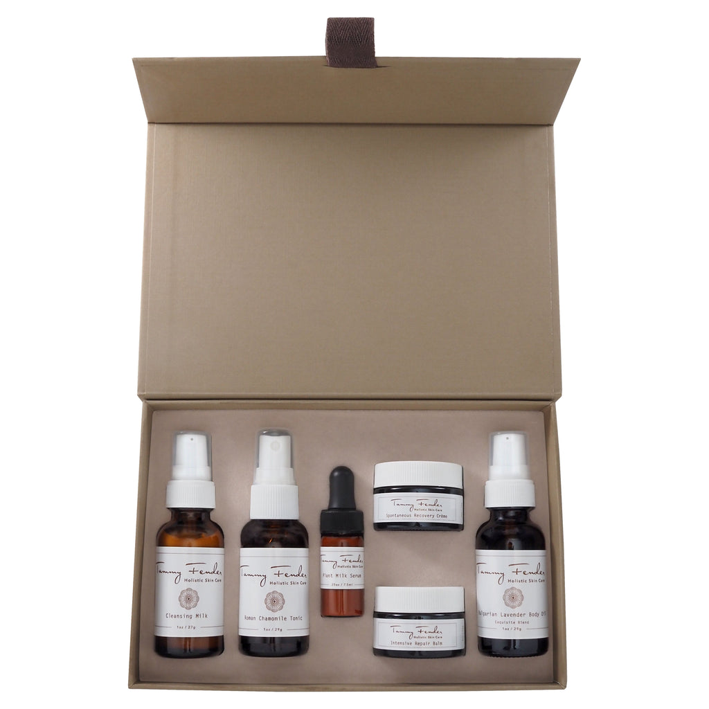 A set of skincare products in a neatly arranged box.
