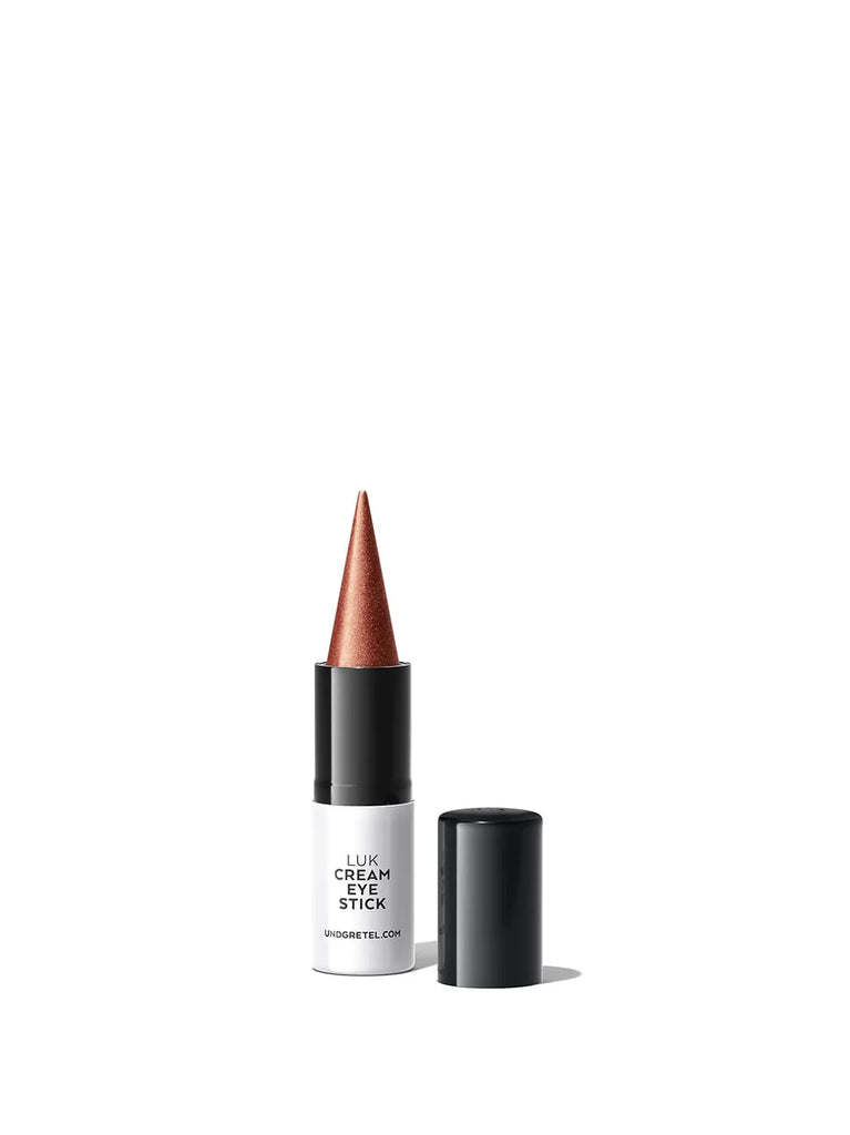 Shimmering stick for easy looks Shade BRONZE 01: The elegant bronze shade with bright, warm and shiny reflector pigments makes every eye color glow.
