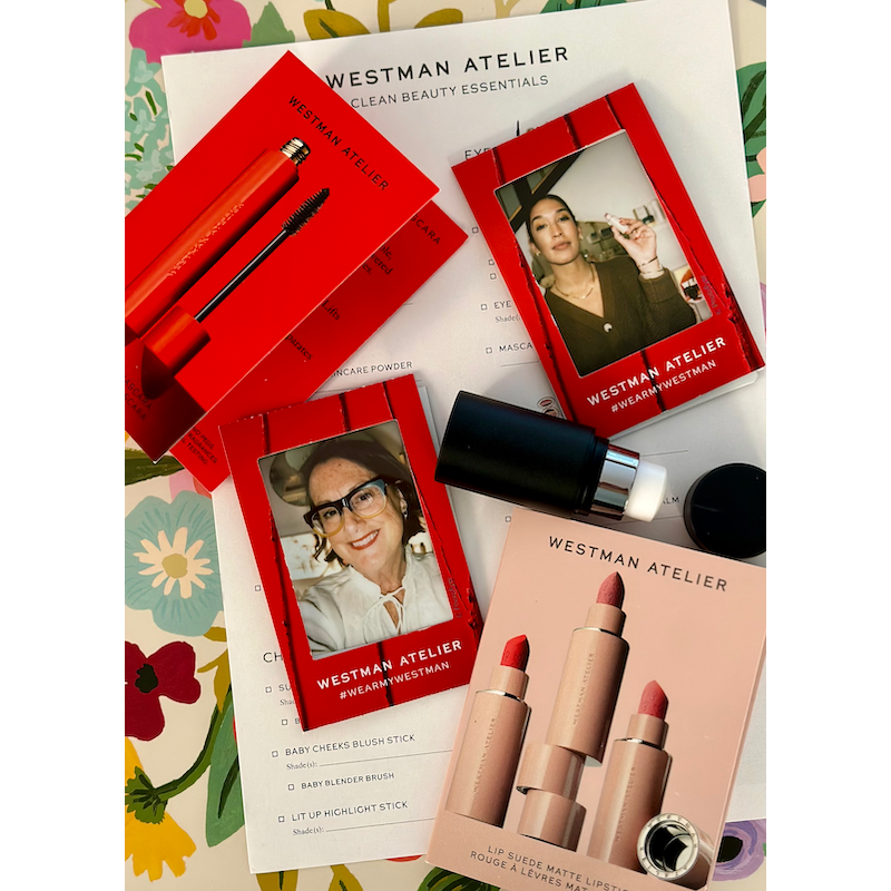 Assorted makeup products from westman atelier alongside promotional images and brochures.