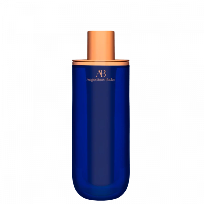 Augustinus bader skincare product in a blue bottle with a copper-colored cap.