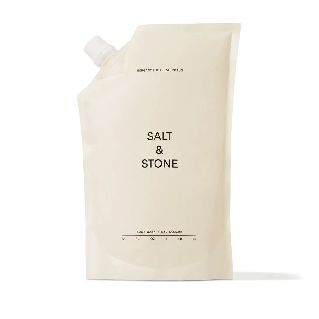 A flexible pouch of salt & stone body wash with a minimalistic design.