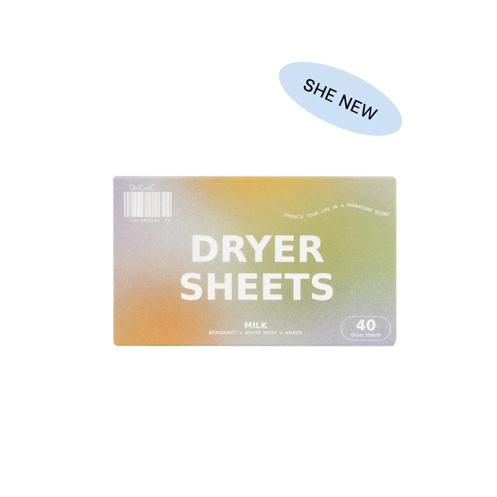 A box of "milk" scented dryer sheets with a label indicating it's a new product.