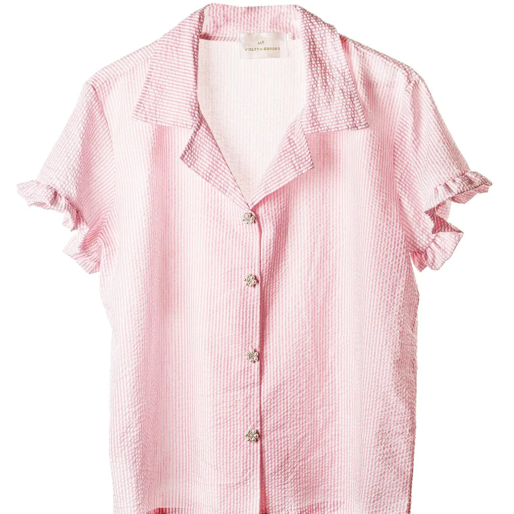 Violet & Brooks Skylar Short Sleeve Ruffle Top - Pink and white striped short-sleeve shirt with ruffle shorts and a collar, featuring front button fastening.