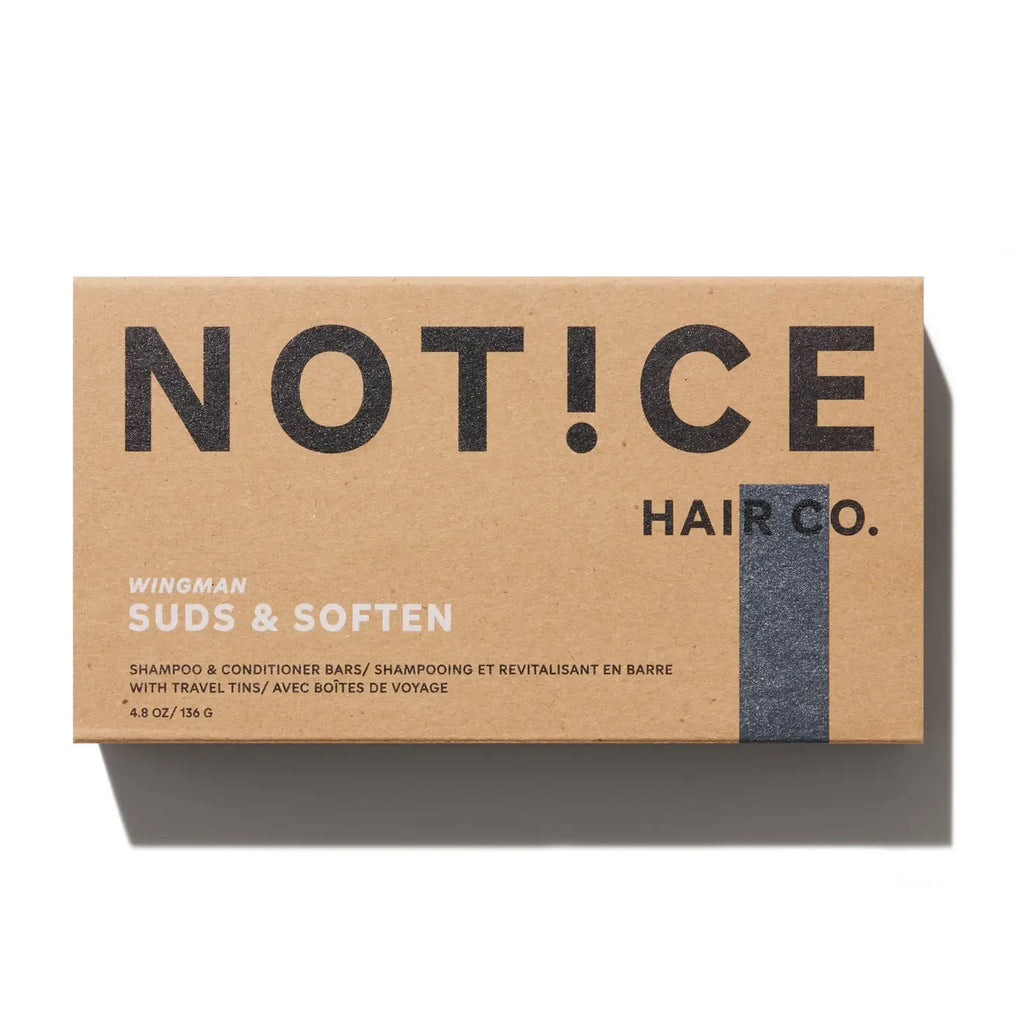 Cardboard packaging of notice hair co. shampoo and conditioner bars with a black wraparound closure.