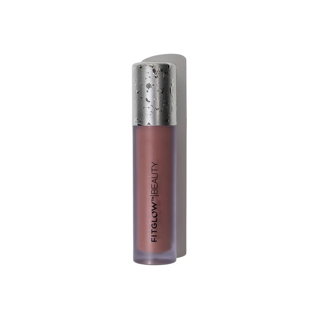 Tube of mauve lipstick with a metallic cap, isolated on a white background.