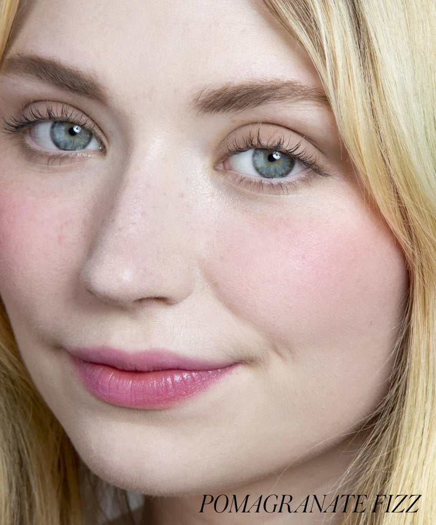 Model wearing shade Pomagranate Fizz