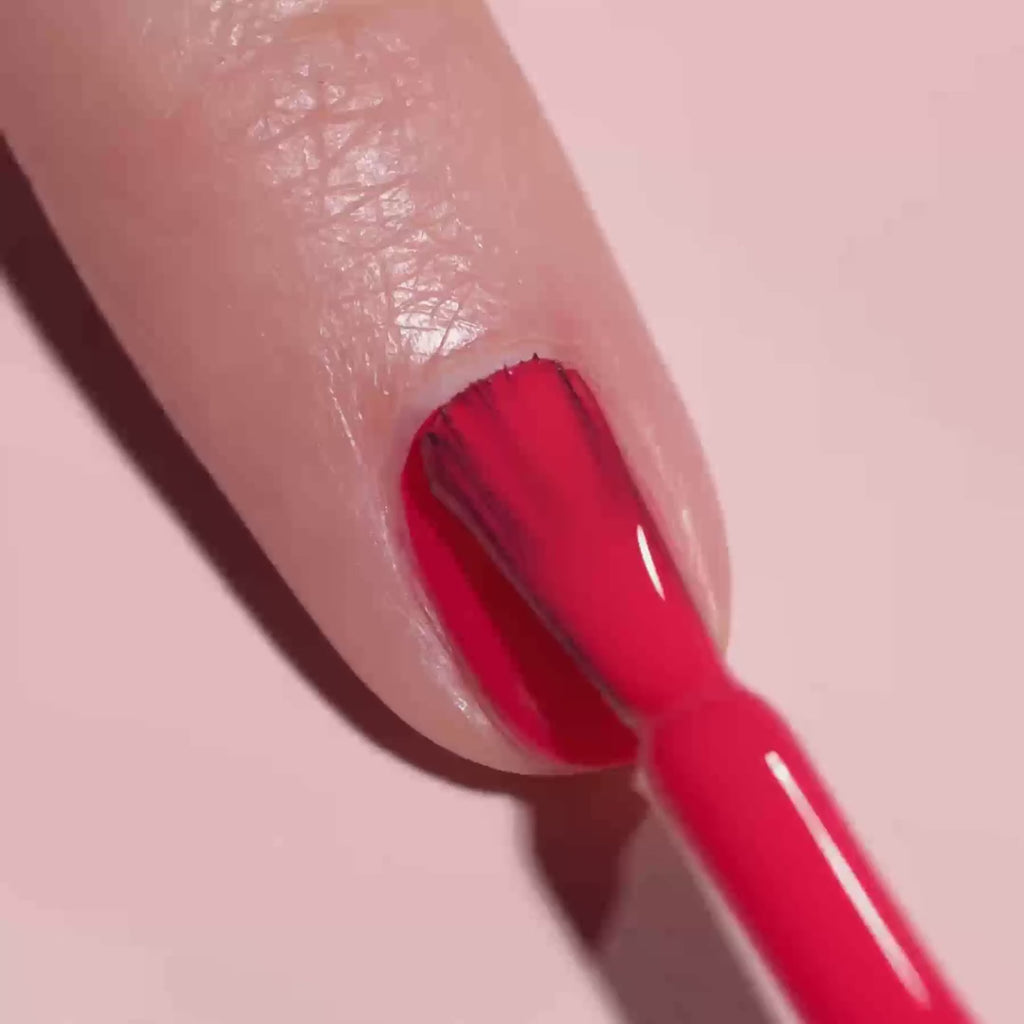 video of someone applying Manucurist nail polish in the shade "Spicy"