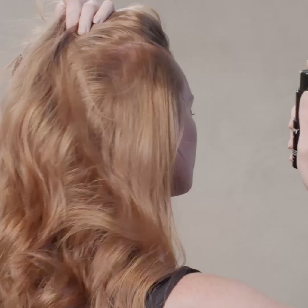 Video of a person applying Arey Wait A Sec dry shampoo