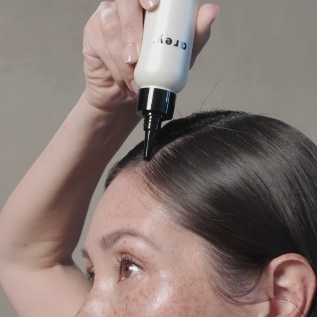 Person applying and using Arey's Scrub