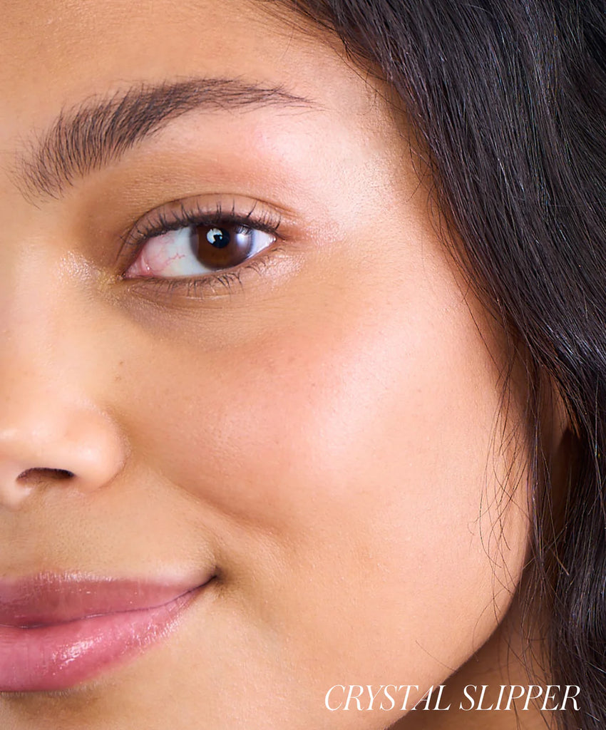 Close-up of a person's face with 'Crystal Slipper' shade.
