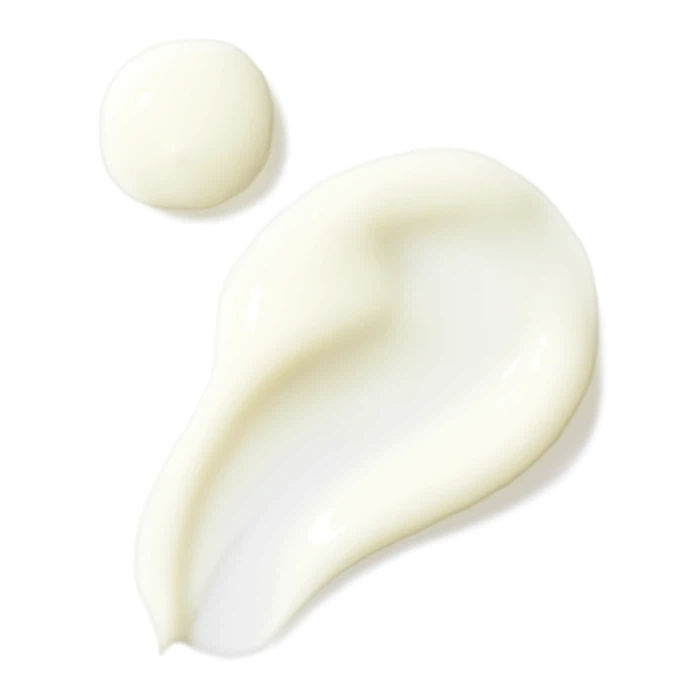 A dollop of cream smudged next to a spherical blob on a white background.