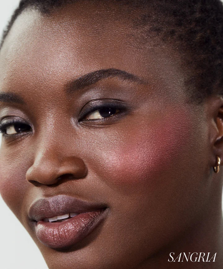 Model wearing shade Sangria