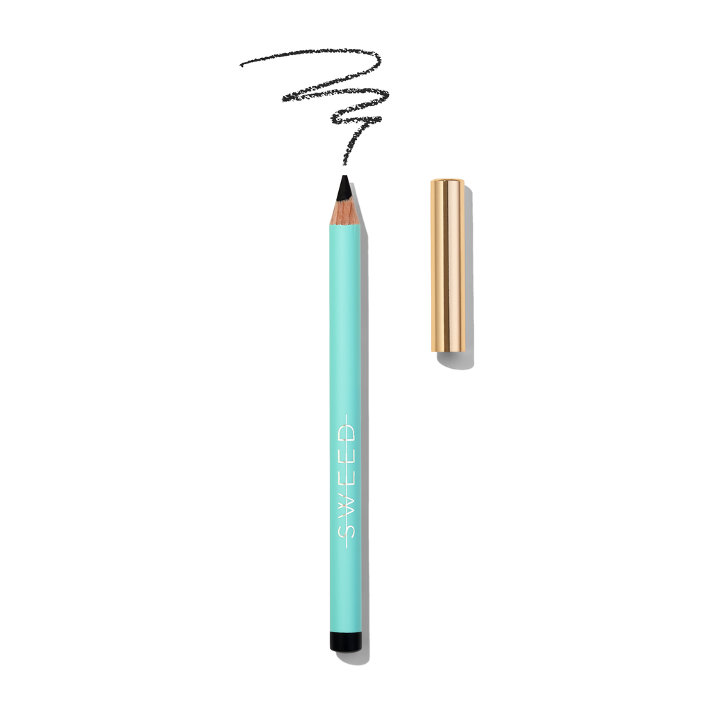 Cosmetic pencil with swatched line and cap removed.