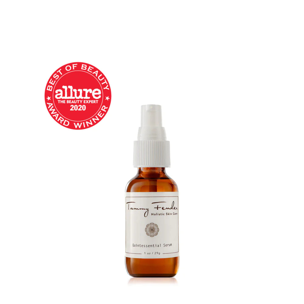 Amber glass bottle with spray nozzle containing "tammy fender quintessential serum" and an allure 2020 best of beauty award badge.