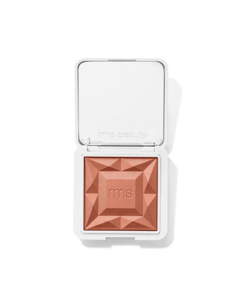 Compact blush with a geometric design and 'rms' branding on a white background