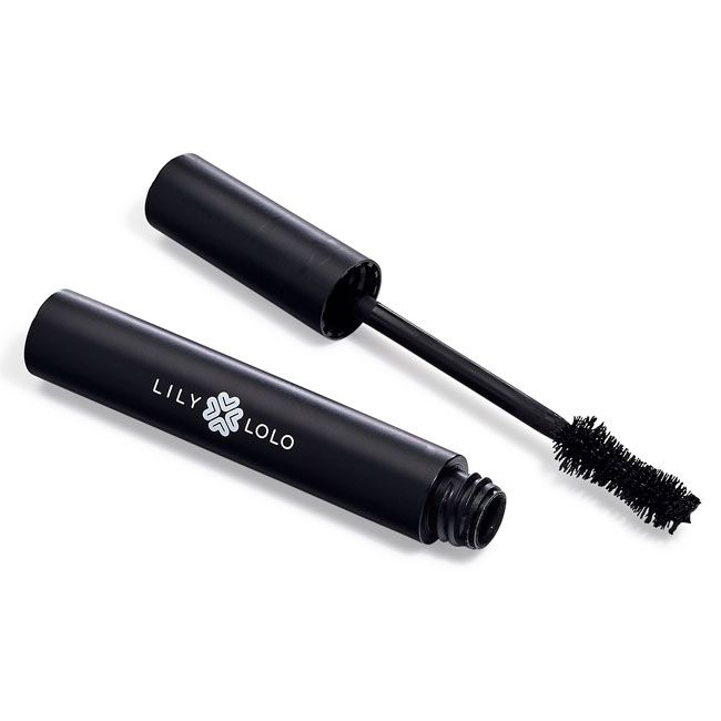 Open tube of black mascara with wand and brush displayed against a white background.