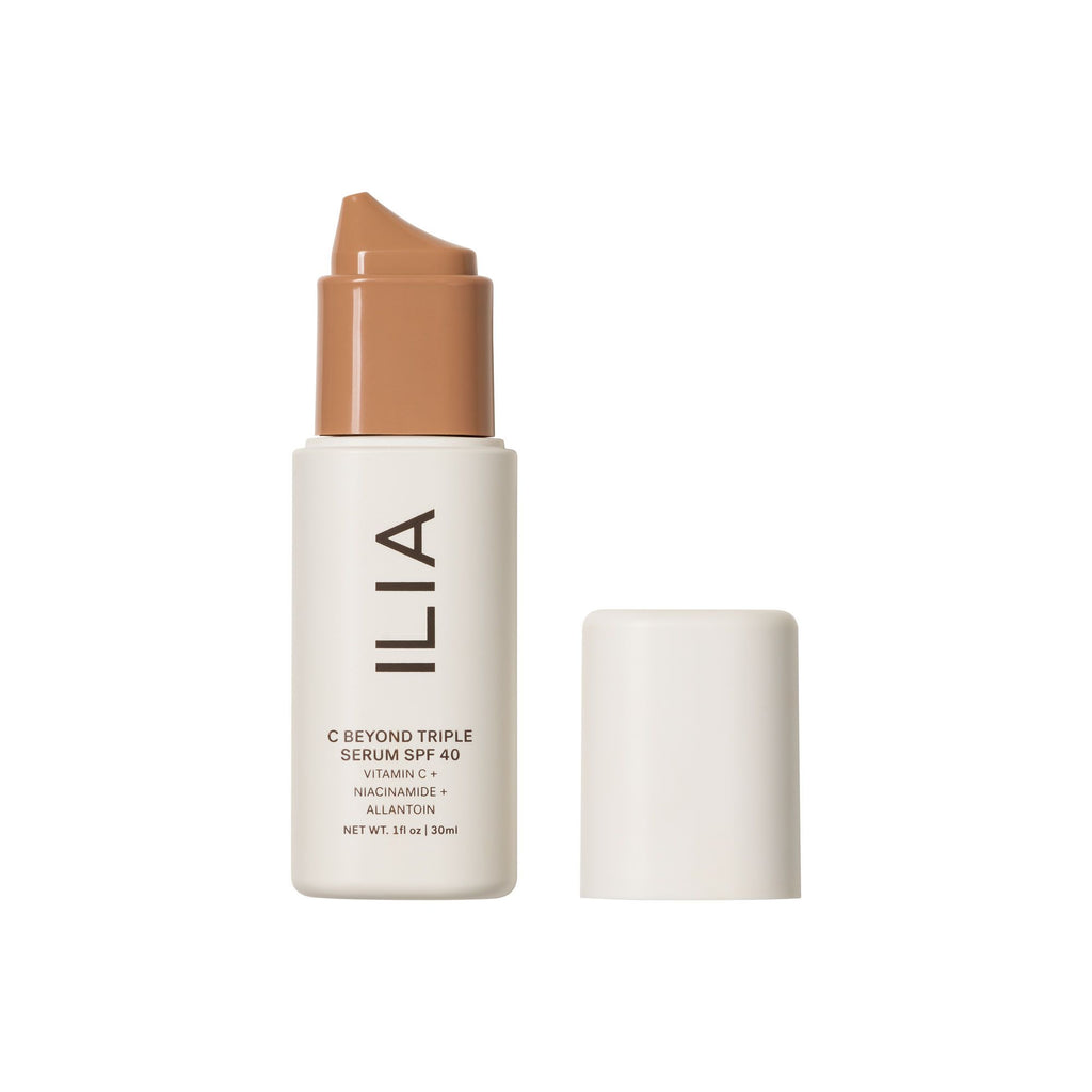 Ilia brand serum foundation with spf 40 in a pump bottle, next to its cap.
