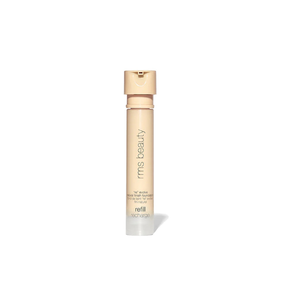 Bottle of rms beauty liquid foundation on a white background.