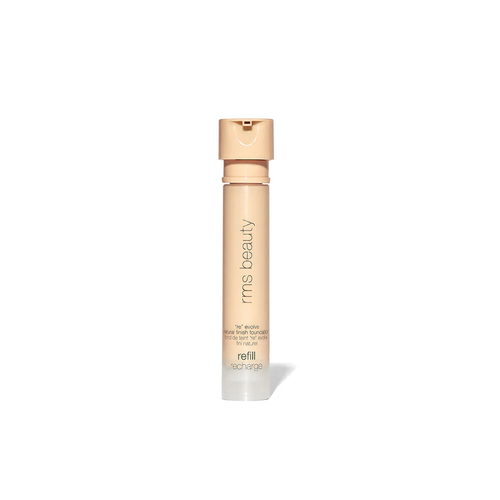 Liquid foundation bottle with a beige label and gold cap on a white background.