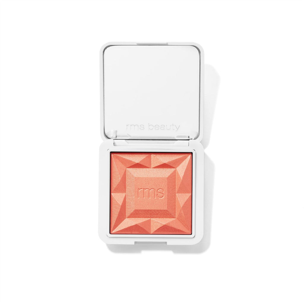 Compact blush with geometric pattern by rms beauty.