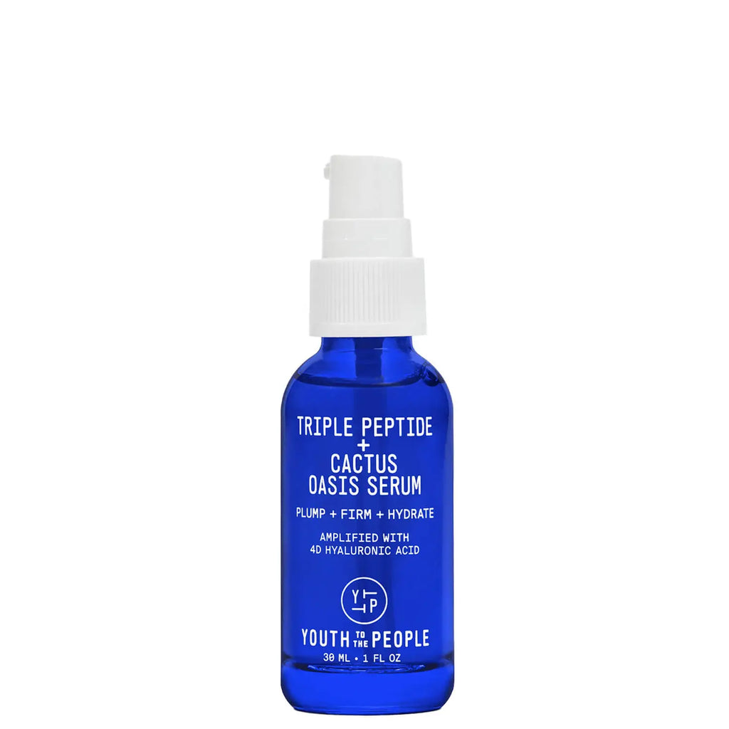 Blue bottle of triple peptide cactus oasis serum with a spray nozzle.