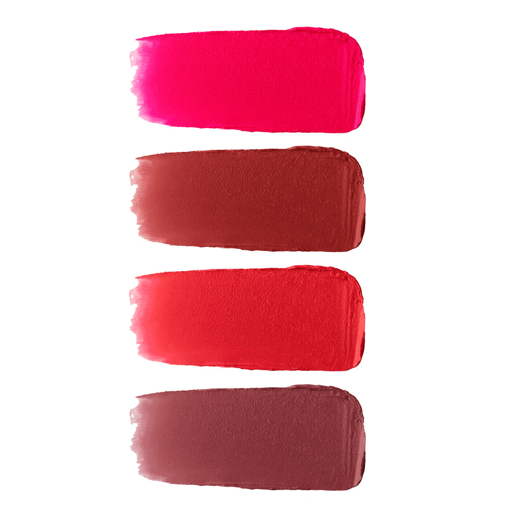 Swatches of four lipstick shades ranging from bright pink to deep berry.