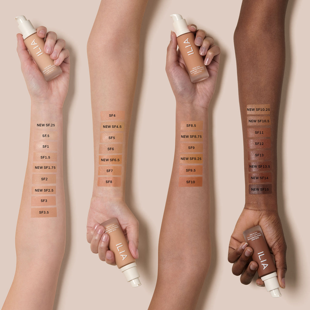 A range of foundation shades swatched on arms of various skin tones.
