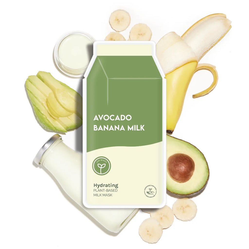 A carton of avocado banana milk surrounded by fresh avocado, banana slices, and a peeled banana, suggesting the natural ingredients of the product.