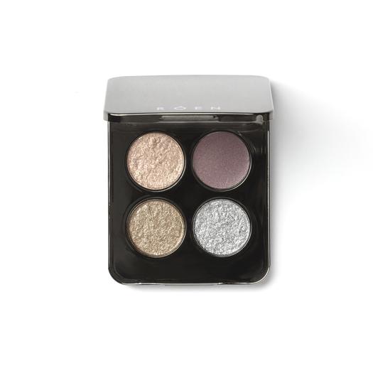 A quad eyeshadow palette with metallic shades on a white background.