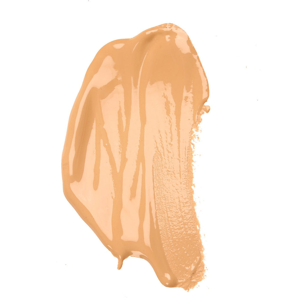 Smear of liquid foundation makeup on a white background.