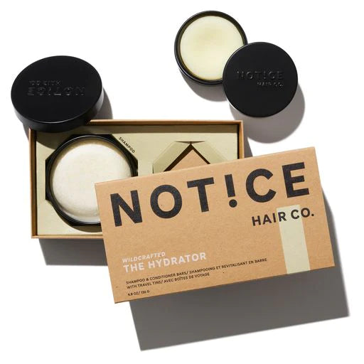 Haircare products from notice hair co., including shampoo bar and conditioner with packaging.
