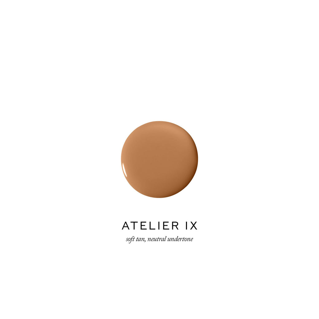 A swatch of foundation makeup with text "atelier ix, 99 tan, natural undertone.