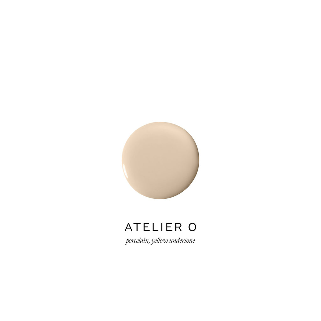 A swatch of porcelain foundation with a yellow undertone from atelier o.