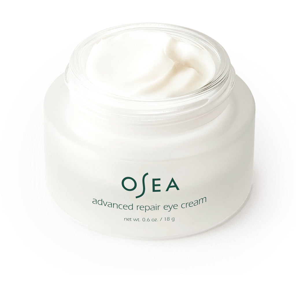 A jar of osea advanced repair eye cream on a white background.