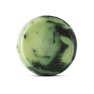 Green and black patterned sphere on a white background.