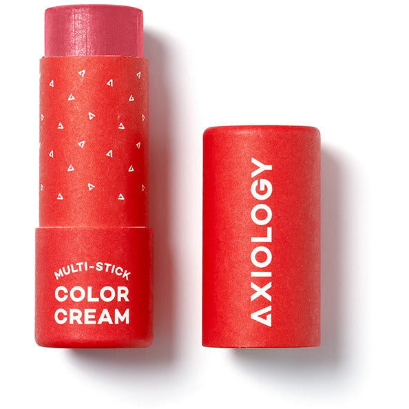 Two axiology multi-stick color creams side-by-side, one with its lid off, against a white background.