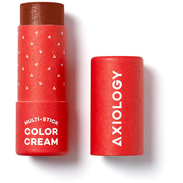 Axiology multi-stick color cream with its cap off, showcasing its texture and packaging.
