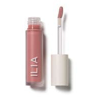 A tube of ilia lip gloss with an applicator wand beside it.